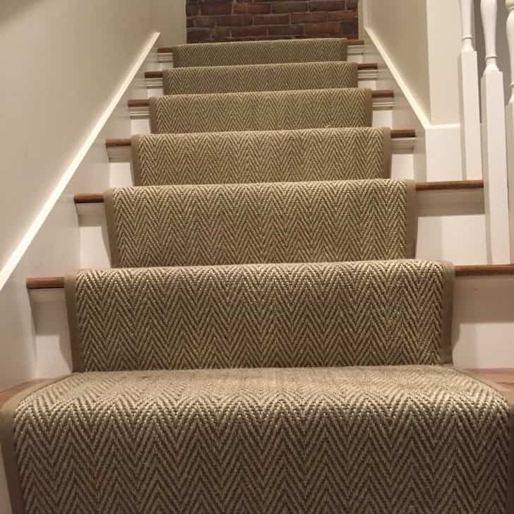 Carpet runner fitted on apartment staircase